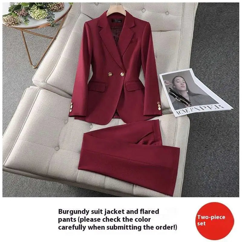Burgundy tailored business suit set with gold buttons featuring a blazer and flared wine red suit pants