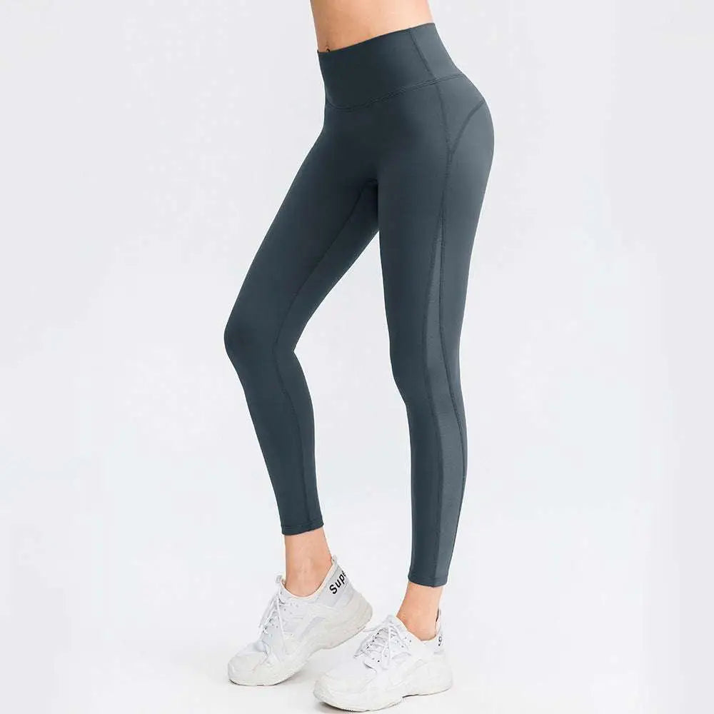 Dark gray seamless high waisted leggings with a sleek form fitting design ideal for butt lifting workout and lifting workout leggings