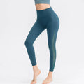 Light blue seamless high waisted yoga pants with sheer side panel designed as butt lifting workout leggings