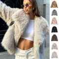 Light gray winter plush coat with a fluffy faux fur material and cozy oversized long sleeve design for cold weather