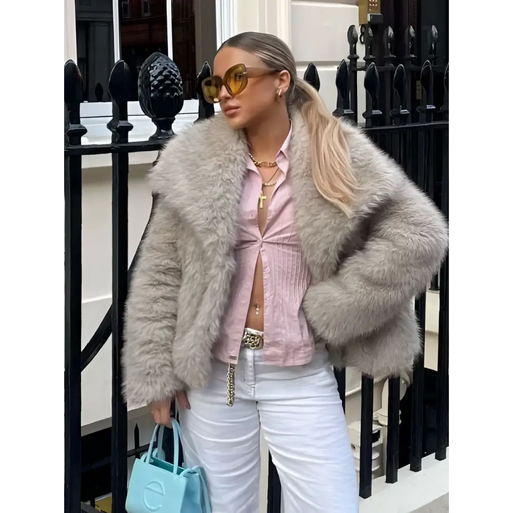 Light gray winter plush coat with plush textured surface and cozy oversized silhouette long sleeve design