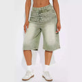 High-waisted light green jeans double belt adjustable buckle shorts in faded olive green denim with multiple belt loops