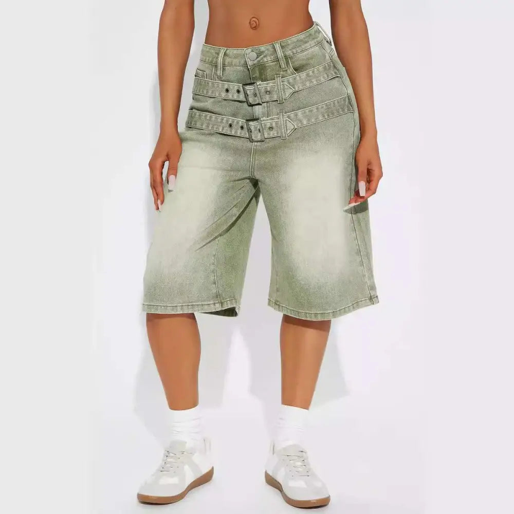 High-waisted light green jeans double belt adjustable buckle shorts in faded olive green denim with multiple belt loops