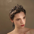 An ornate black crystal wedding tiara with intricate metalwork showcasing luxury socialite style hair accessory