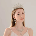 A sparkling silver crystal wedding tiara with intricate details in luxury socialite style for elegant socialite style hair