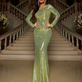 A lime green slim long sleeve sequined mermaid gown with a shimmering fitted silhouette for elegant occasions