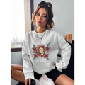 White oversized long sleeve sweatshirt featuring a detailed lion rose regular design with black text clear strong brave