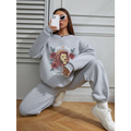 Gray oversized long sleeve sweatshirt featuring a lion and rose graphic design from the lion rose regular fit collection