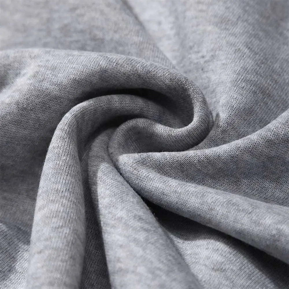 Soft heather gray knit fabric with subtle texture and folds in lion rose regular fit long sleeve sweatshirt