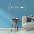 Wooden tripod side table with gray textured fabric top and integrated wireless charging for smart voice devices