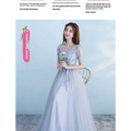 Long bridesmaid blue lace and tulle dress with three quarter sleeves and flowing skirt for blue wedding dress occasions