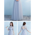 Long bridesmaid blue lace dress with sleeves featuring delicate lavender lace high neckline and open back lacing details