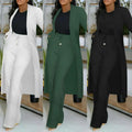 A plus-size woman wearing a long cardigan sunken stripe set with wide leg pants in white green and black