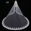 Long lace wedding veil meters wide style featuring a flowing white lace wedding veil with intricate floral embroidery edges