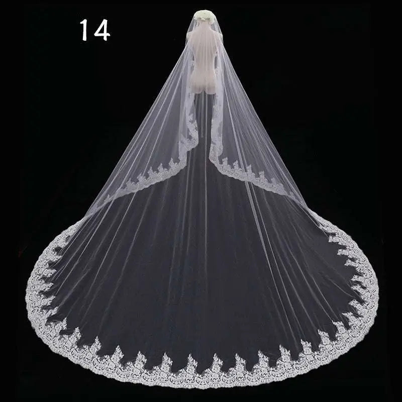 Long lace wedding veil meters wide style featuring a flowing white lace wedding veil with intricate floral embroidery edges
