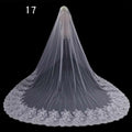 Long lace wedding veil in white lace with intricate floral embroidery and scalloped edge for bridal wear