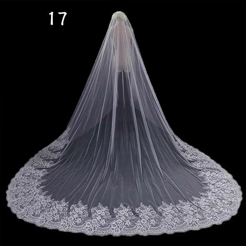 Long lace wedding veil in white lace with intricate floral embroidery and scalloped edge for bridal wear