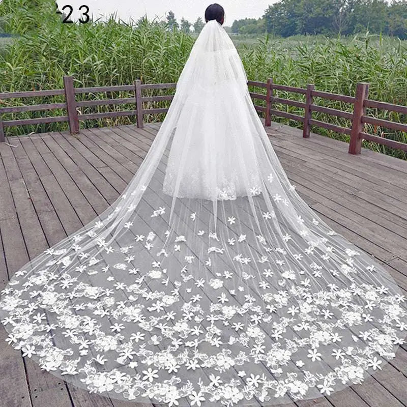 Long lace wedding veil meters wide style featuring a flowing white design with intricate floral embroidery lace wedding veil