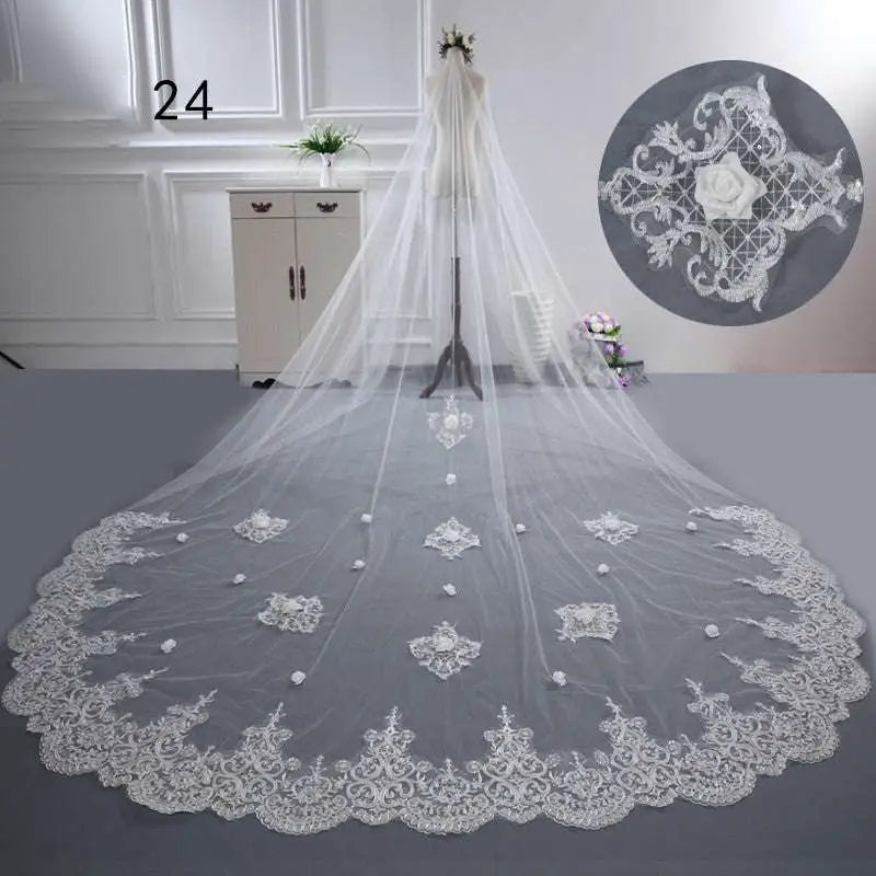 Long lace wedding veil in white made of delicate lace with intricate floral embroidery and beaded accents along the hem