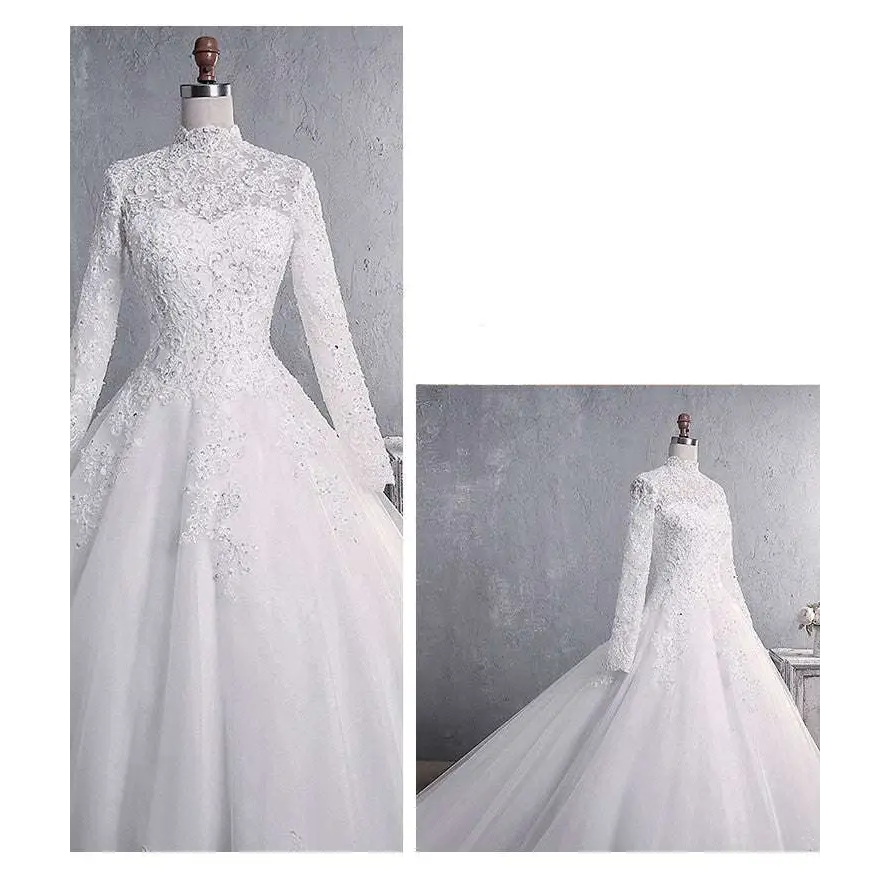 White lace wedding gown with long sleeve lace, high neckline, and intricate floral embroidery in a large tail bridal gown