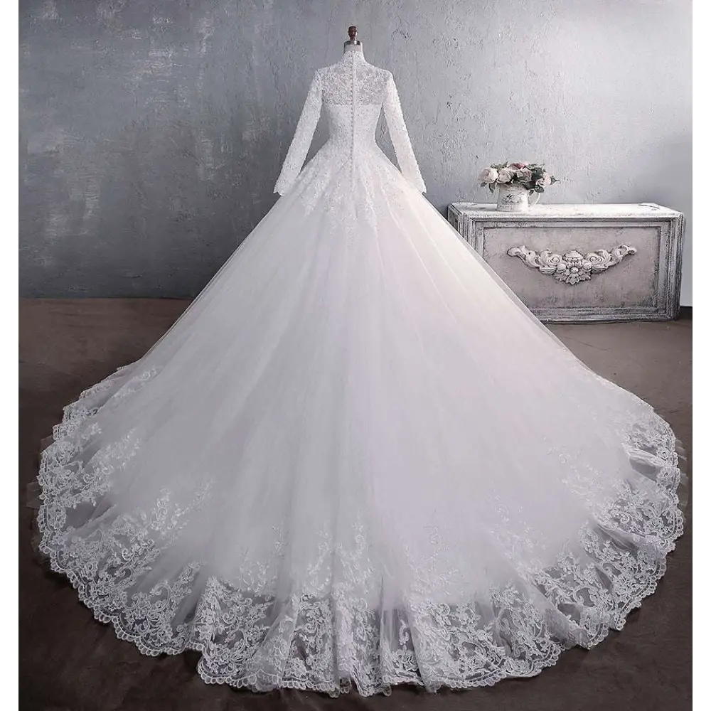 Elegant white lace wedding dress with long sleeves high neckline and intricate floral embroidery for bridal gown