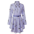 Purple and white long sleeve striped shirt dress with black bird illustrations cinched at the waist by a blue belt