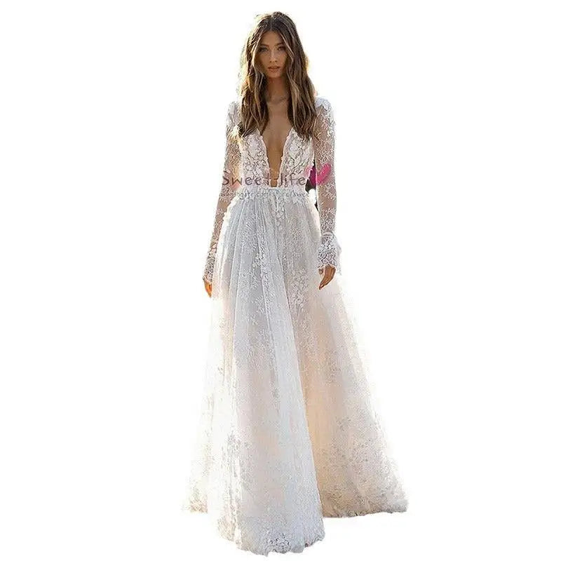 Elegant white long sleeve wedding dress lace gown with delicate fabric and deep v neckline for bridal wear