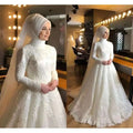 White lace dignified wedding dress featuring long sleeves and a high neckline for elegant bridal wear