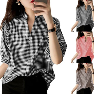 Black and white half sleeve plaid v neck blouse with relaxed fit and three quarter length sleeves for casual wear