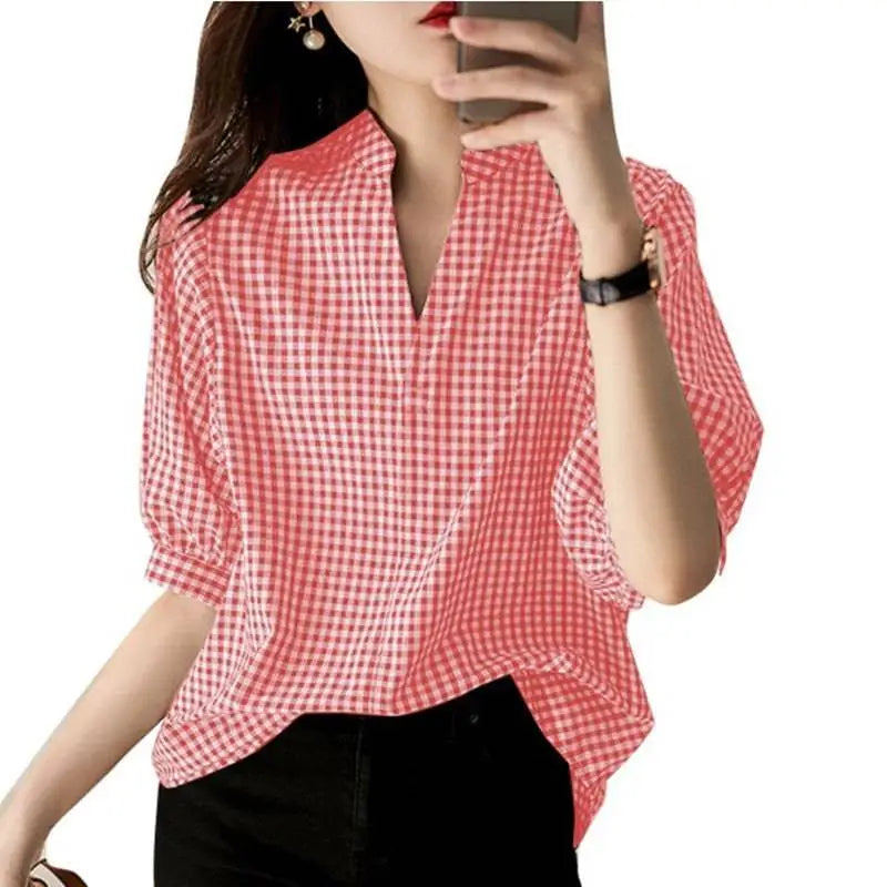 Loose casual half sleeve plaid v neck blouse in pink and white gingham check with slightly puffed shoulders