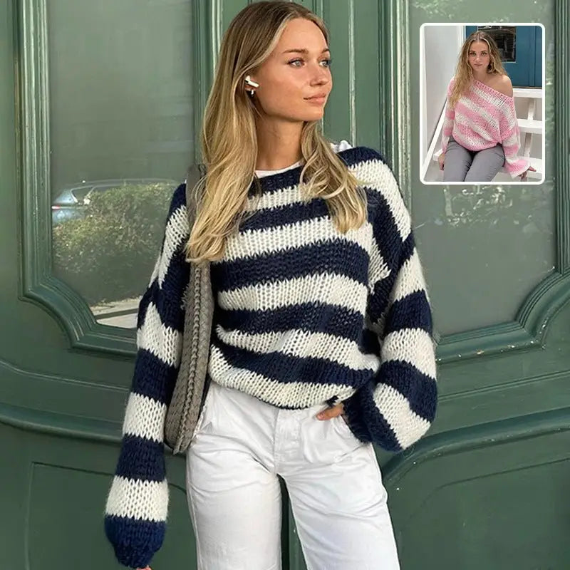 Navy and white horizontally striped knit loose pullover sweater for women with a cozy loose striped design