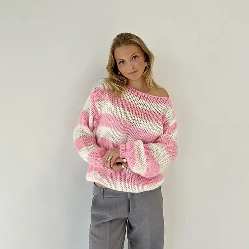 Cozy loose striped off-the-shoulder pullover sweater for women in chunky knit with wide pink and white diagonal stripes
