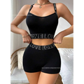 Black love letter camisole and leggings set with love lettering on waistband and straps in athletic two-piece design