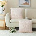 Luxurious soft faux fur throw pillow in blush pink with plush textured surface for elegant cushion covers