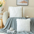 Luxurious soft faux white fur throw pillow with plush texture and square shape for elegant cushion covers
