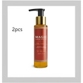 A sleek amber glass bottle of luxury amber soothing body oil with a gold pump and elegant red label with gold patterns