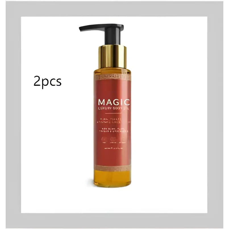 A sleek amber glass bottle of luxury amber soothing body oil with a gold pump and elegant red label with gold patterns