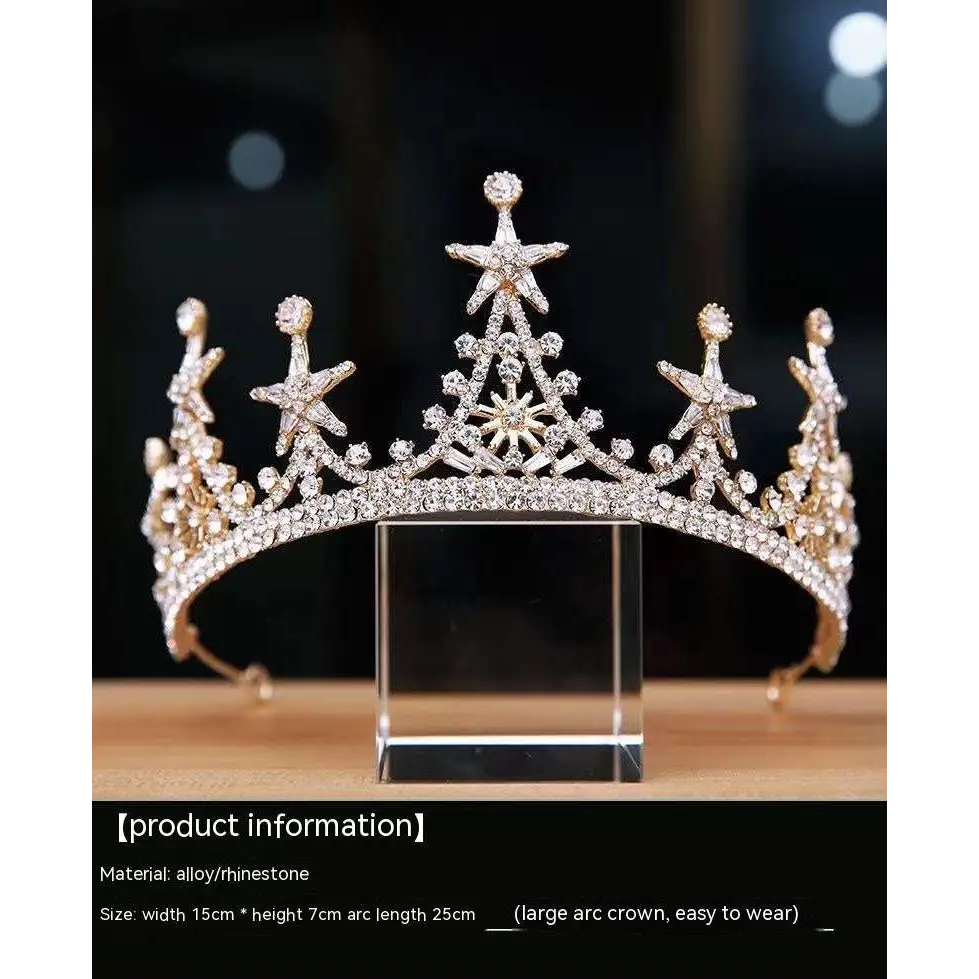 Luxury atmosphere bridal crown with sparkling gold, clear crystals, and intricate star-shaped rhinestone embellishments