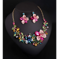 A luxury color flower crystal jewelry set featuring a vibrant multi-colored floral necklace with pink and blue gemstones