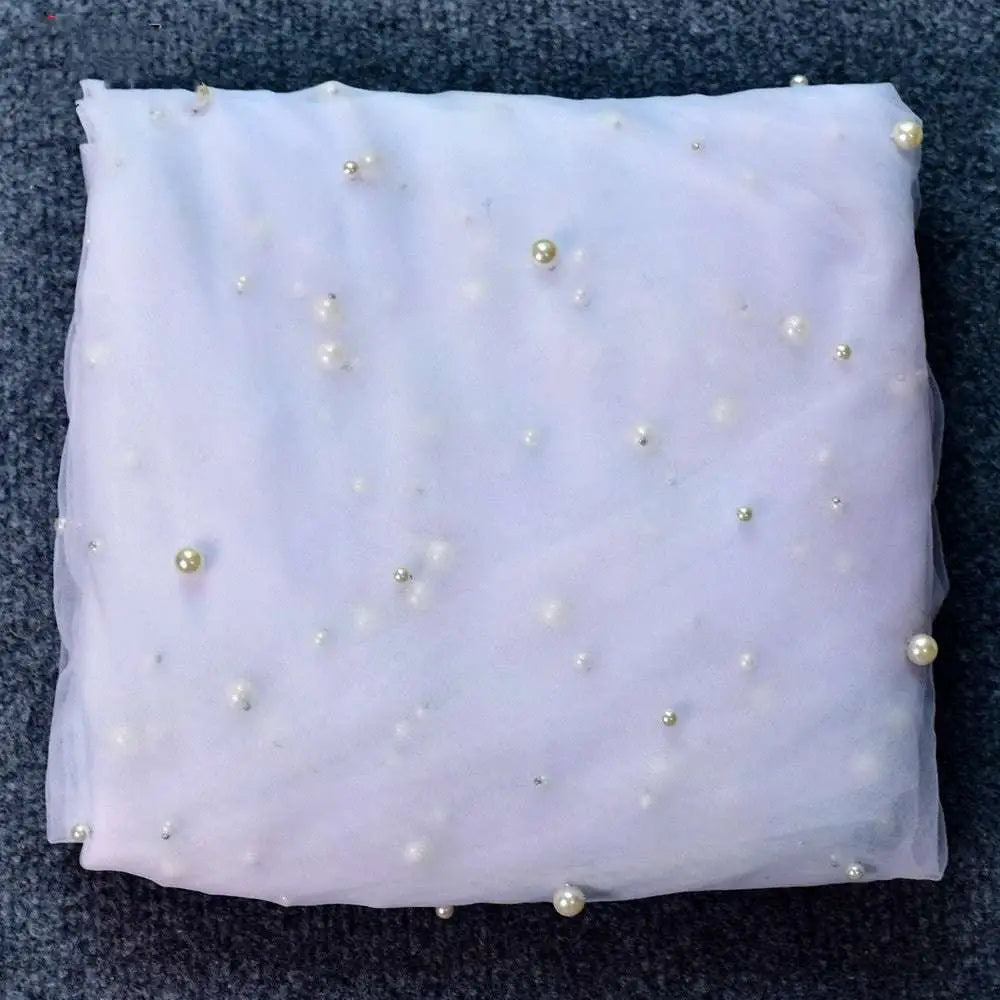 Luxury heavy industry bridal pearl veil in lavender sheer fabric with scattered pearl-like bead embellishments and tiara