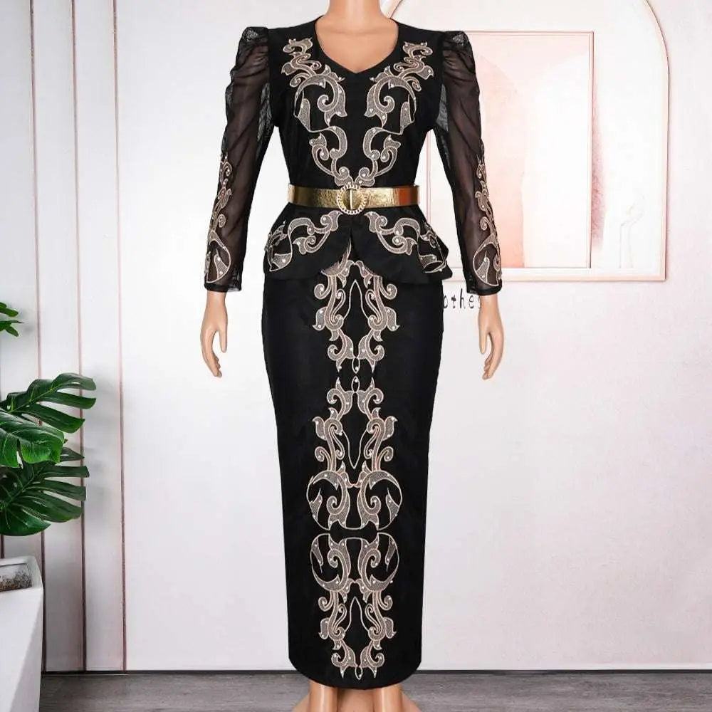 Luxury rhinestone beaded black peplum formal dress with intricate gold embroidery and sheer long sleeves with gold belt