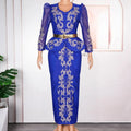 Luxury rhinestone beaded royal blue peplum formal dress with gold embroidery and sheer puff sleeves cinched at waist