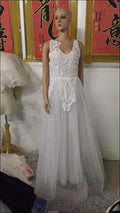 Luxury women’s fashion white floral lace wedding dress with fitted bodice and flowing tulle skirt perfect for weddings