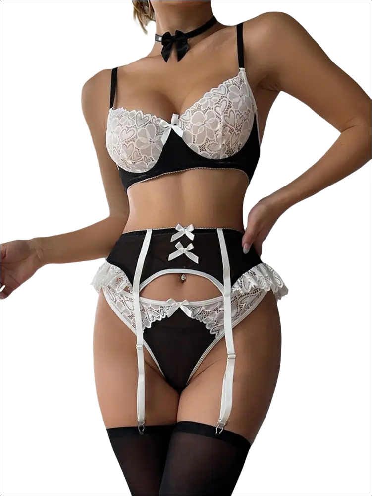 Luxury women’s fashion black and white lace lingerie set with garter straps showcasing elegant delicate design