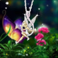 A luxury women’s fashion tinker bell pendant necklace in silver and gold with glittering wings on a delicate chain