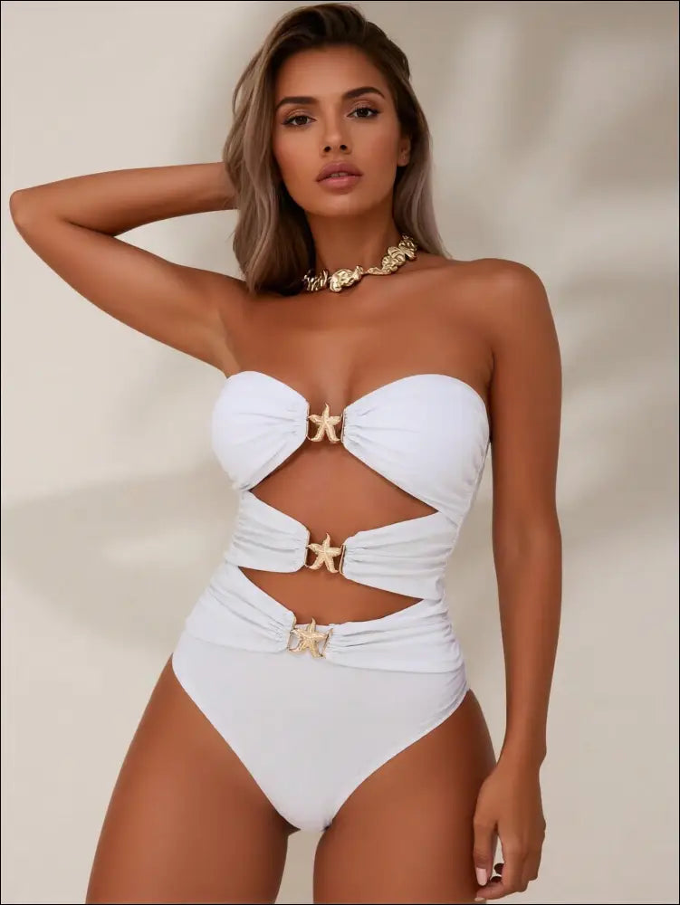 Luxury women’s fashion white strapless one-piece swimsuit with gold star buckles and cut-out details