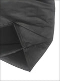Black quilted faux leather bag with stitched seams and padded design complements luxury women’s fashion