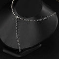 Luxury zircon necklace and earrings set featuring a silver chain choker with beaded edge and adjustable extension