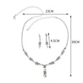 Silver-toned luxury zircon necklace with floral and teardrop pendant design and 23cm chain in earrings set featuring luxury women’s fashion