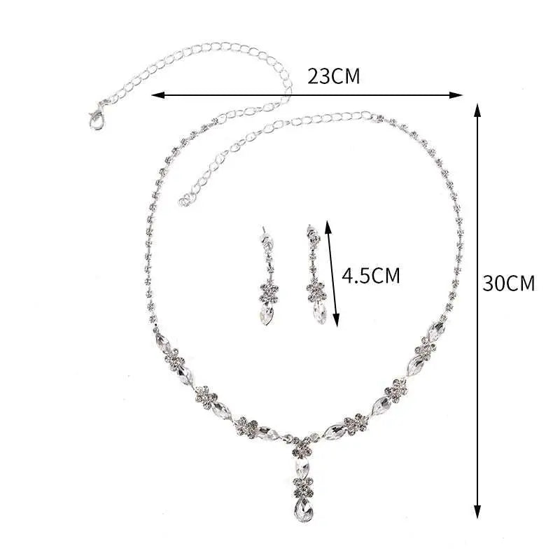 Silver-toned luxury zircon necklace with floral and teardrop pendant design and 23cm chain in earrings set featuring luxury women’s fashion
